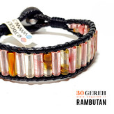 دستبند سنگی کوارتز چری اصل تراش لوله ای استوانه با چرم ضخیم دستبند رامبوتان