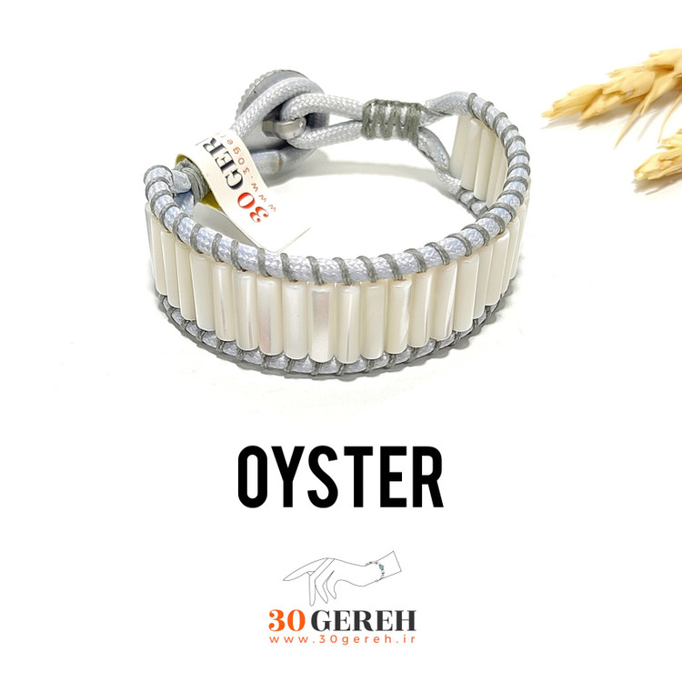 دستبند صدف اصل تراش استوانه ای خاص با چرم طوسی